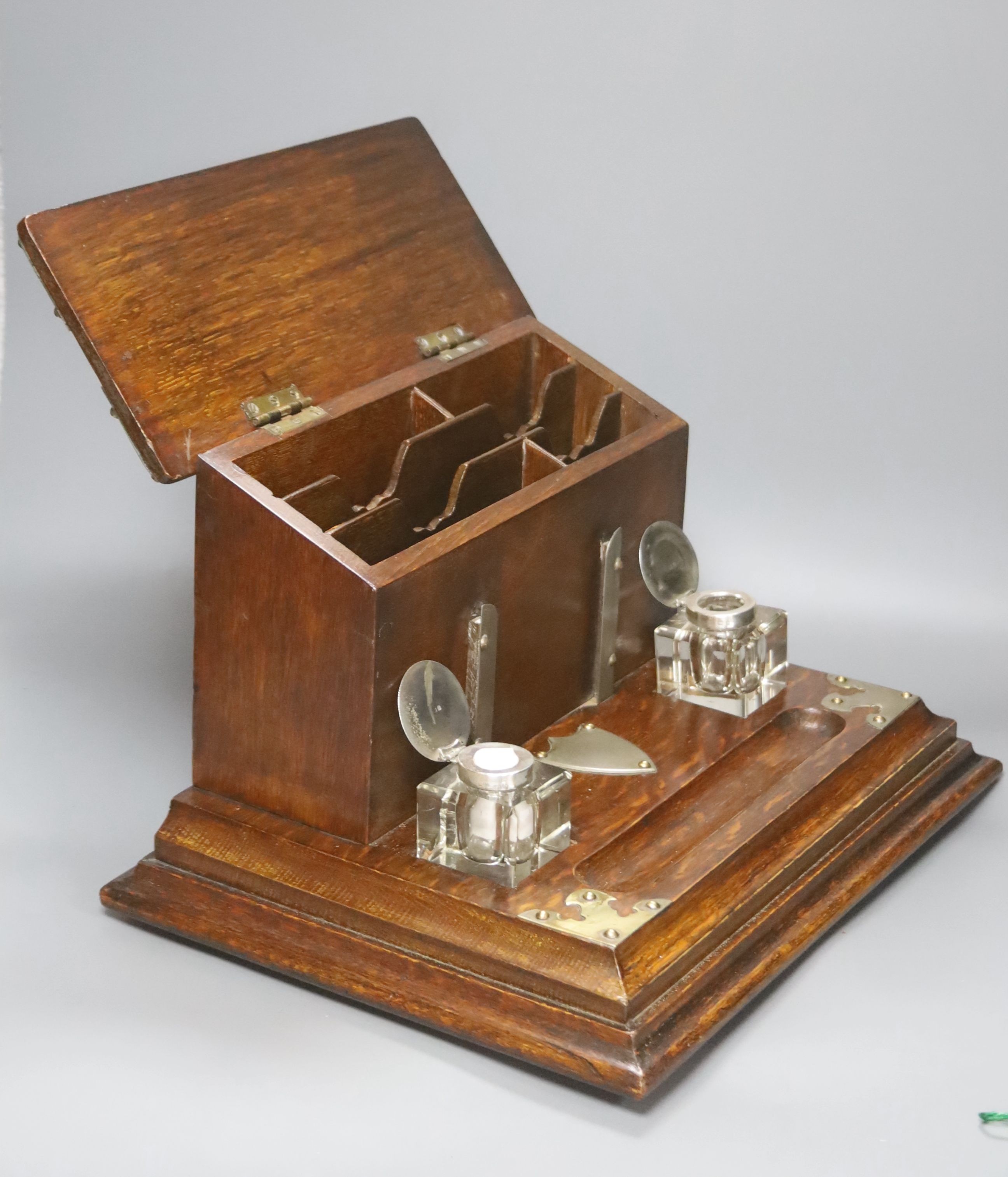 A Victorian brass bound oak combination stationary box / inkstand, width 36cm